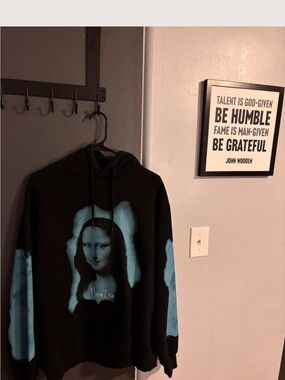 Pull&BearBlack Hoodie with Blue Mona Lisa Graphic